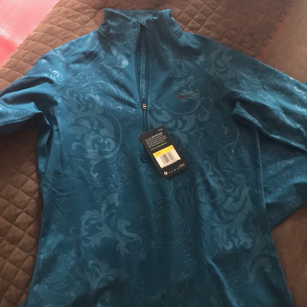 Nike pants and top.